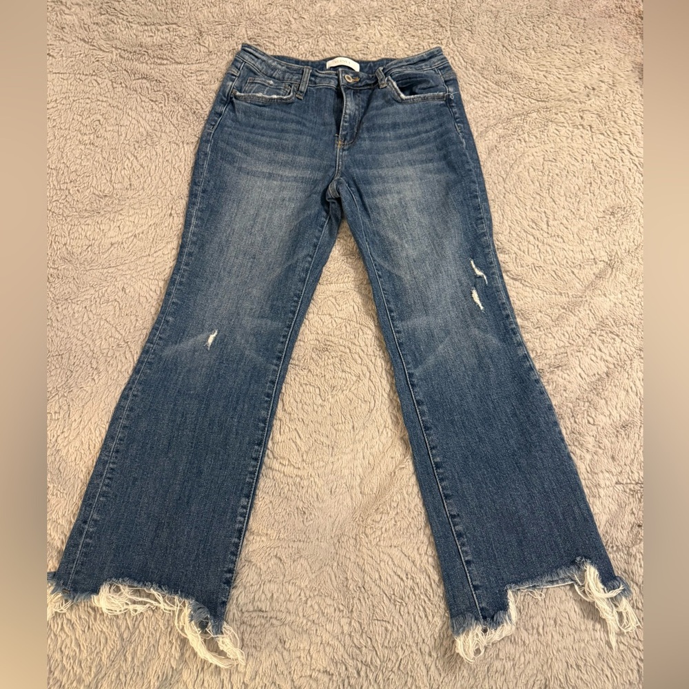 Classic Denim Flare Jeans with Frayed Hem